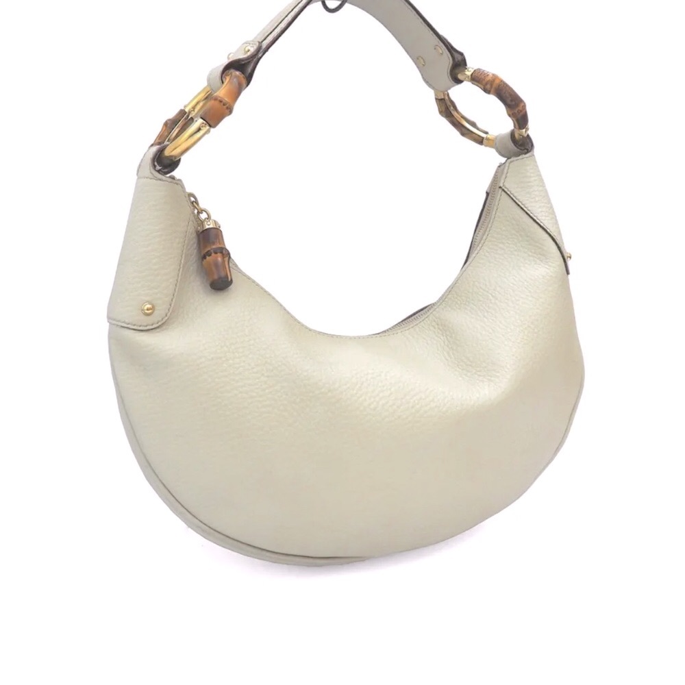 GUCCI OFFWHITE LEATHER HALF MOON BAG
Authentic with Bamboo Ring